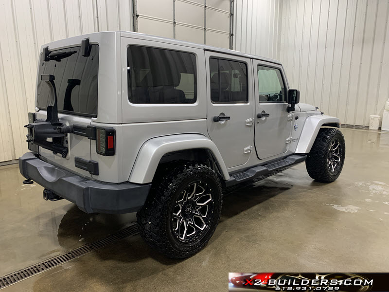 Salvage 2012 Jeep Wrangler Unlimited Sahara Arctic | X2 BUILDERS